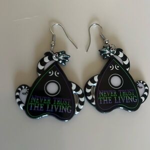 never trust the living earrings.